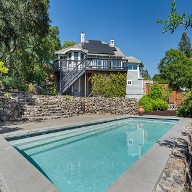 3250 Cobblestone Dr picture of back of house and sparkling pool 3250 Cobblestone Dr picture of back of house and sparkling pool
